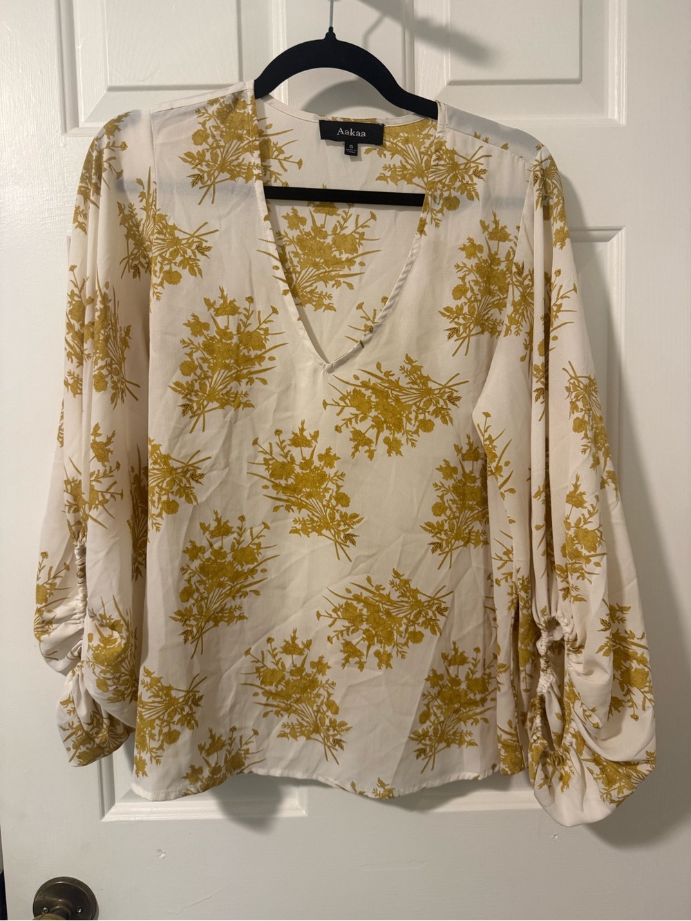 Aakaa White V-Neck Blouse with Mustard Floral Print